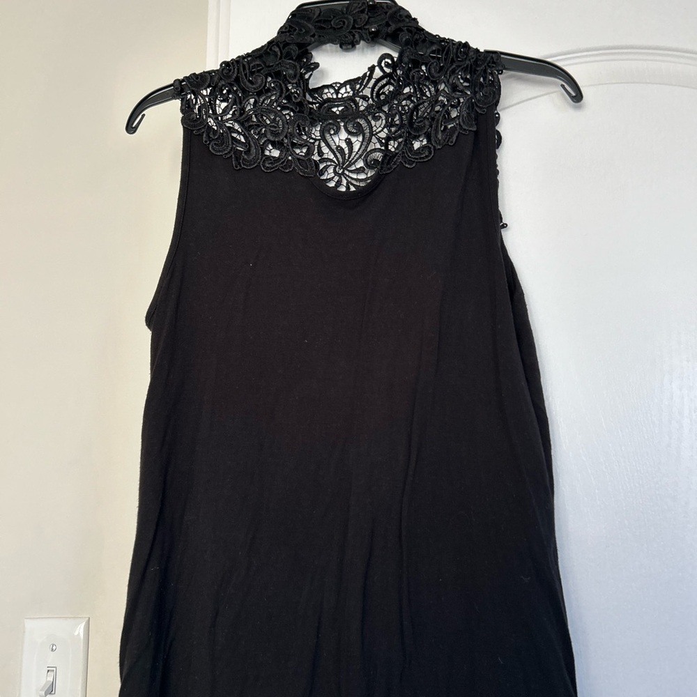 Black Sleeveless Top with Lace Neckline. From Miss Selfridges. U.K.